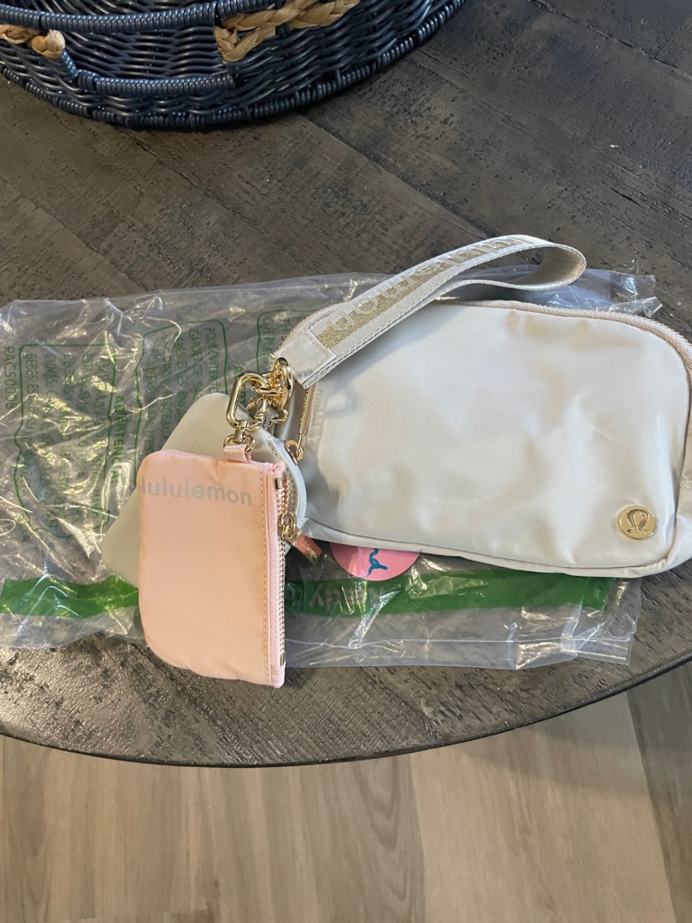 lululemon athletica grey crossbody bag with pink card pouch